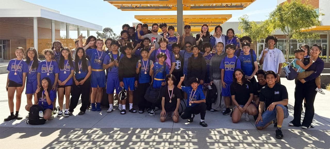 Marauder Machine combined wrestling team gathered after competition