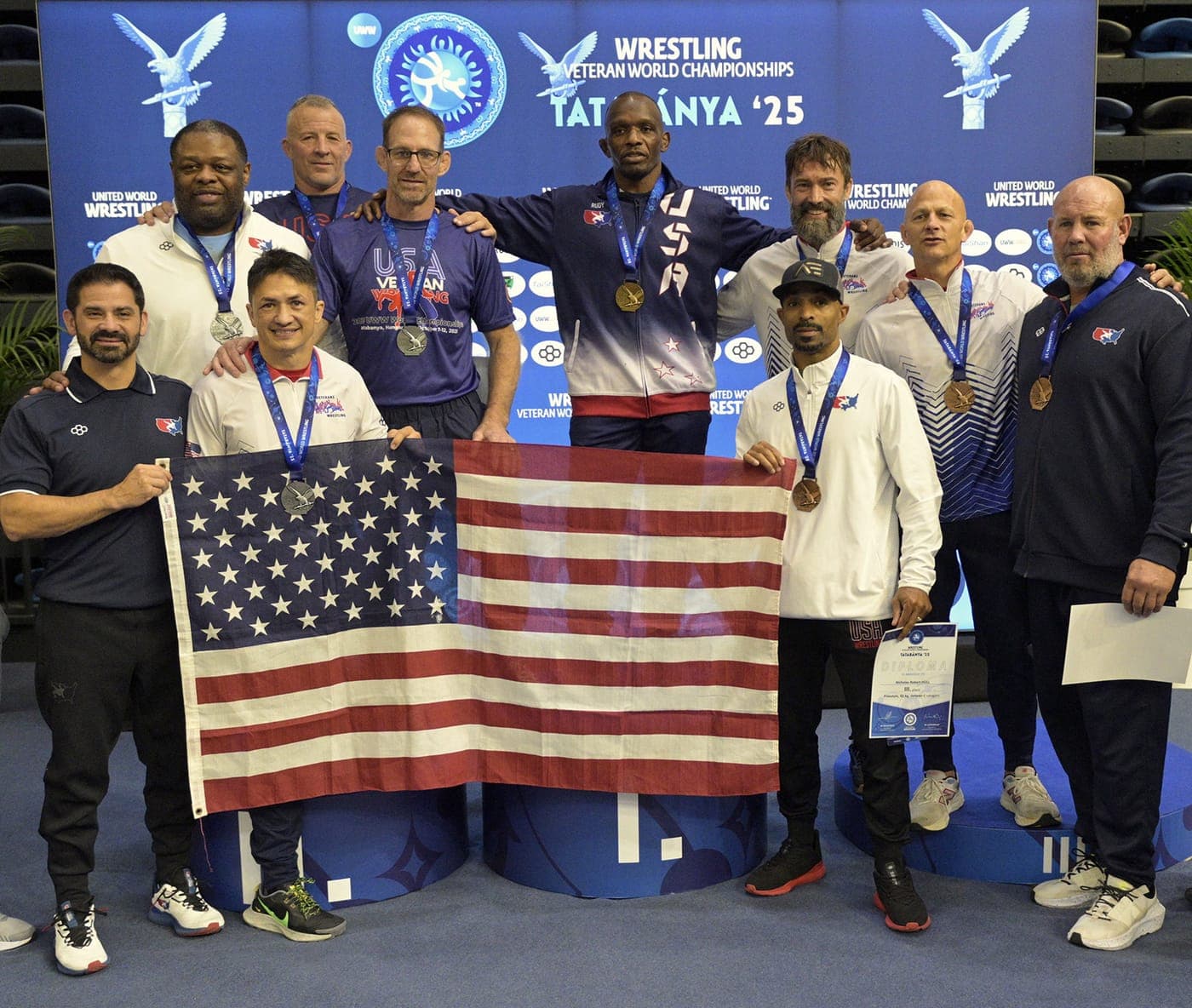 Team USA Veteran wrestlers on the podium at the 2025 UWW Veteran World Championships in Tatabánya, Hungary